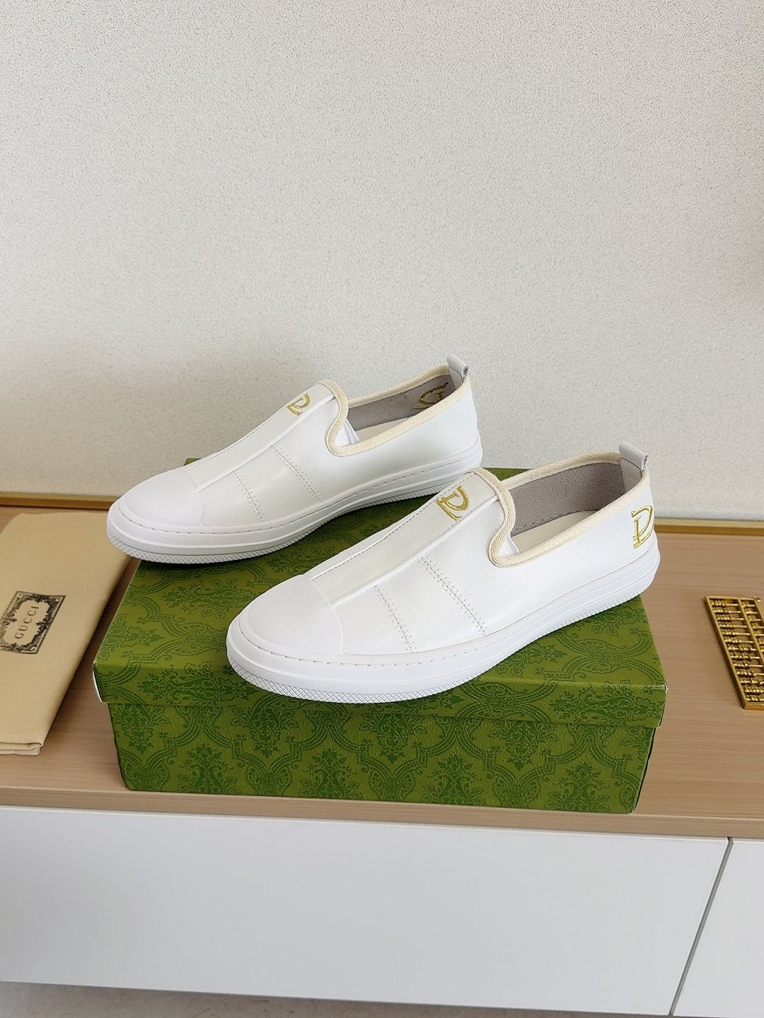 Gucci Brown Slip-On Sneakers with White Toe Caps