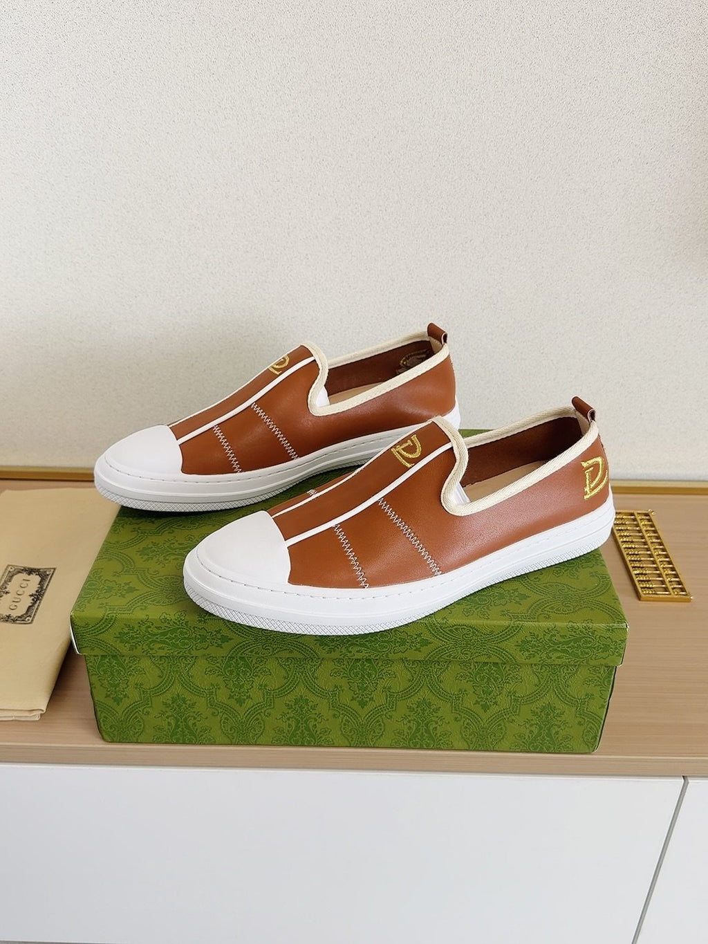 Gucci Brown Slip-On Sneakers with White Toe Caps