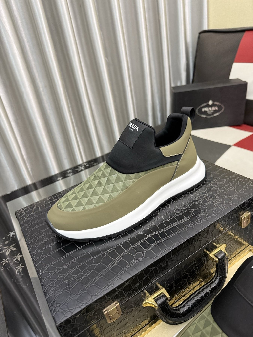 Prada Black Quilted Slip-On Sneakers
